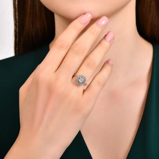 0.09 ct. Diamond Laranj Baguette Ring